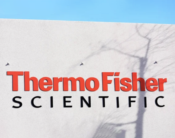 Logo of ThermoFisher Scientific on the side of a building that decided to do a major layoff